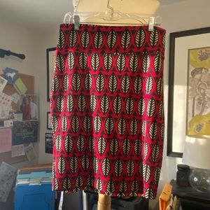 Lularoe LARGE stretchy midi-skirt…red, black, green and cream. Geometric pattern